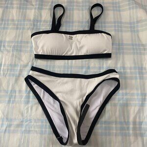 Celine's Classic Black And White Bikini Top Is A Bandeau-Style Halter Top.